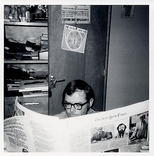 Reading the NY Times in his tidy PHS office, circa 1973